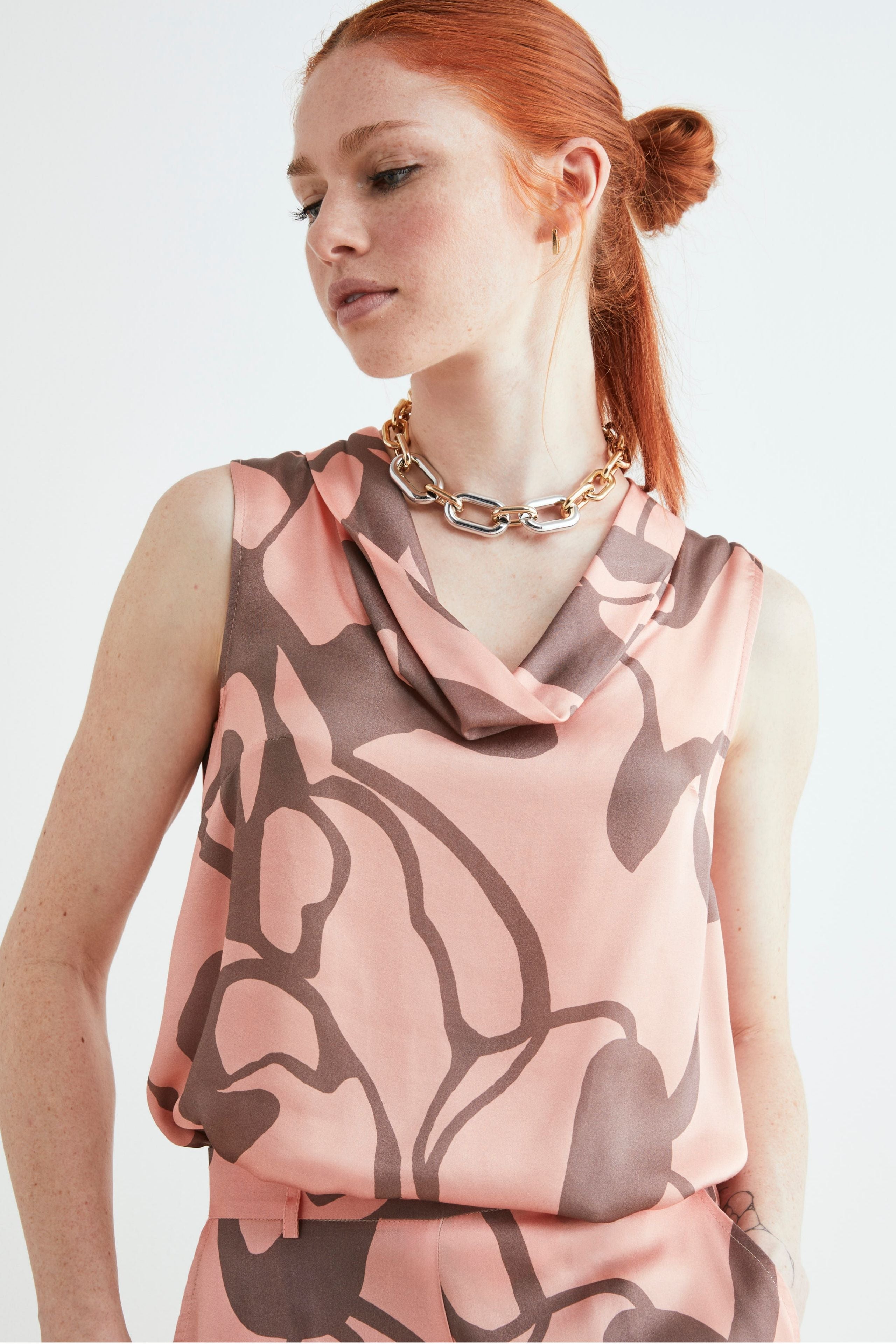 ’
Blouse with cascading neckline’ - Pink pattern